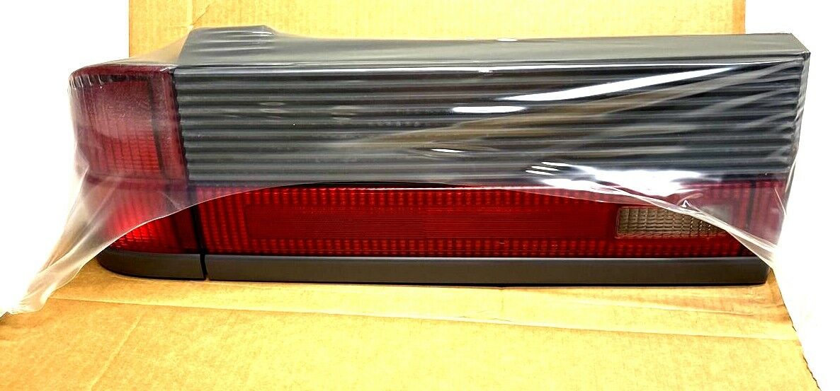 New OEM Ford Mercury Topaz Tail Light Driver Side 1986-1987 E66Y-13405-D